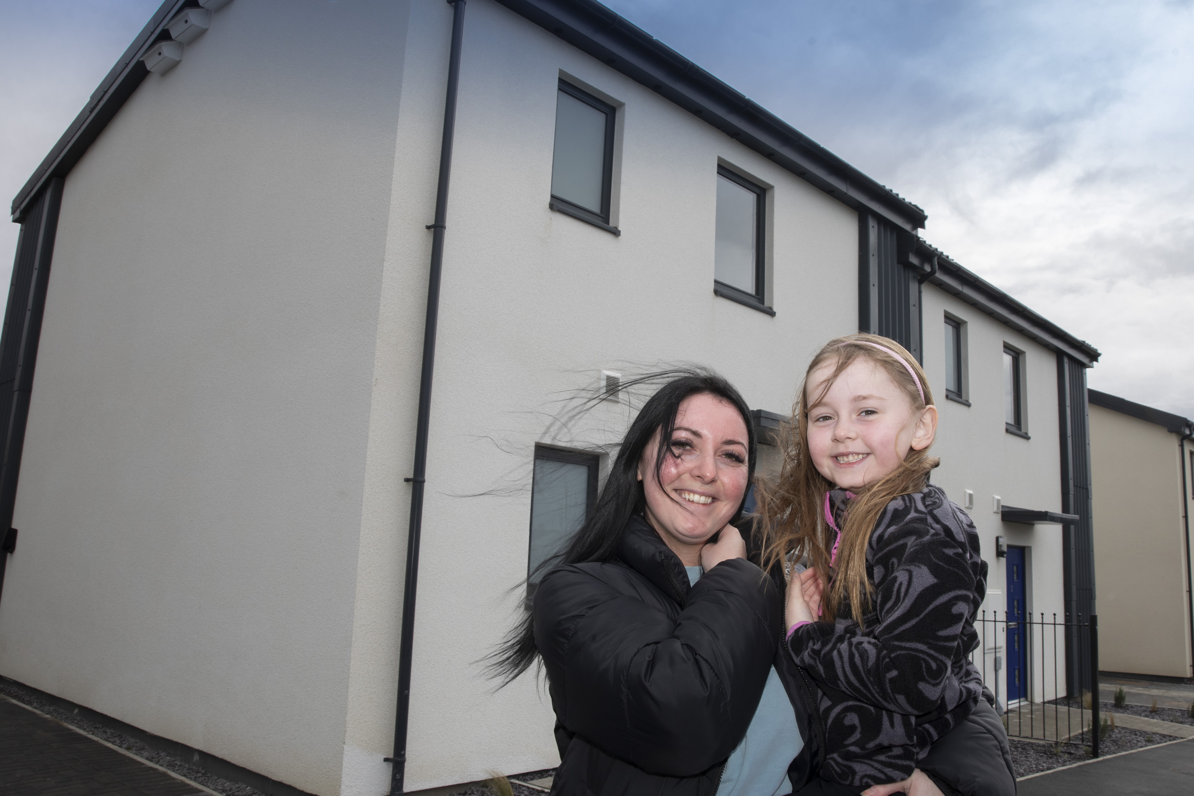 Excited residents move into new eco-friendly housing development in The Mart, Valley