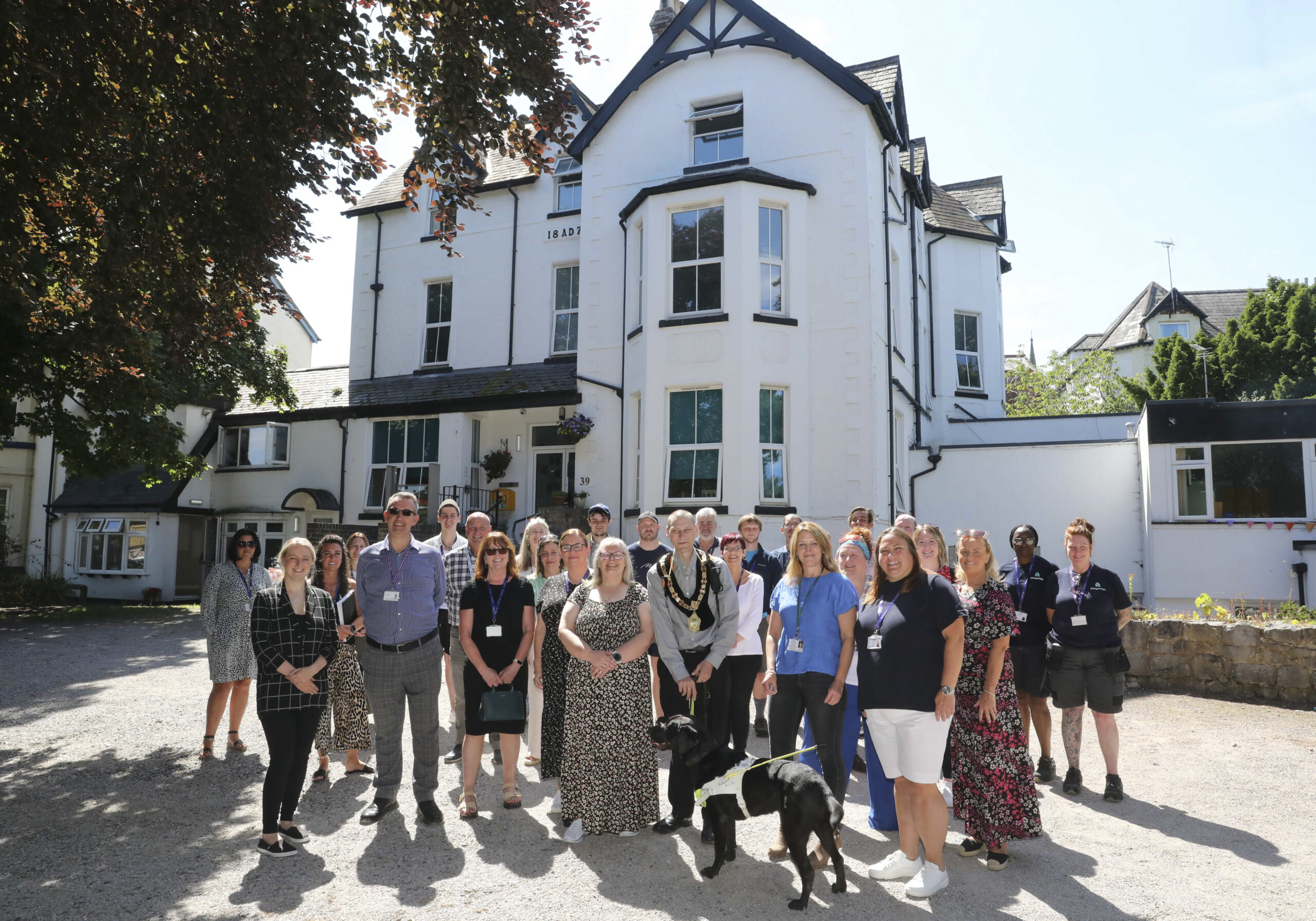 Community leaders celebrate Norfolk House’s commitment to combatting homelessness in Conwy