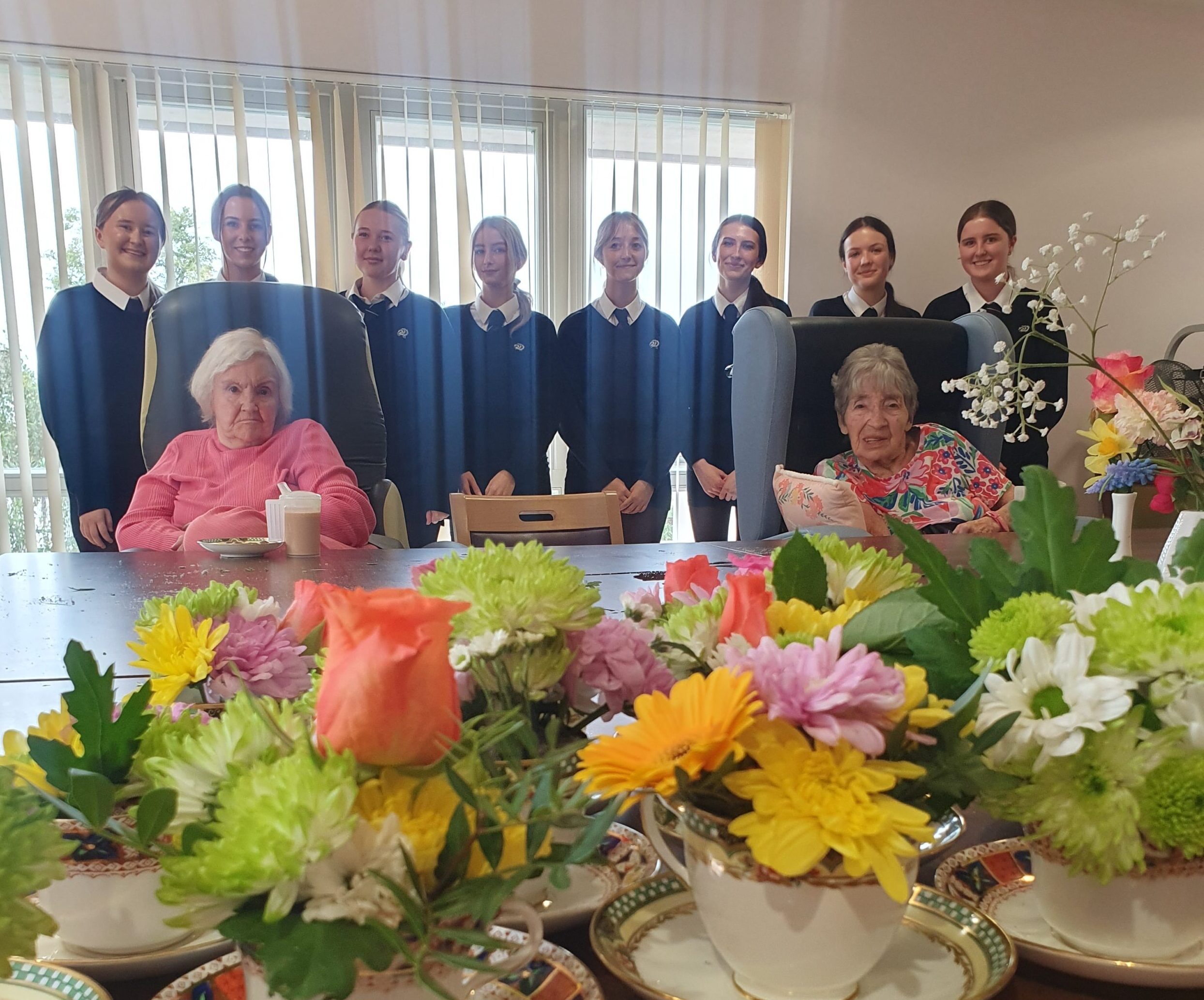 Pupils from Rydal Penrhos and Ysgol Eirias bring laughter to nursing home residents in Colwyn Bay